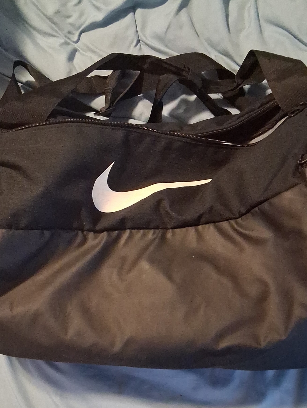 Nike Black Men's Duffel Bag with White Swoosh